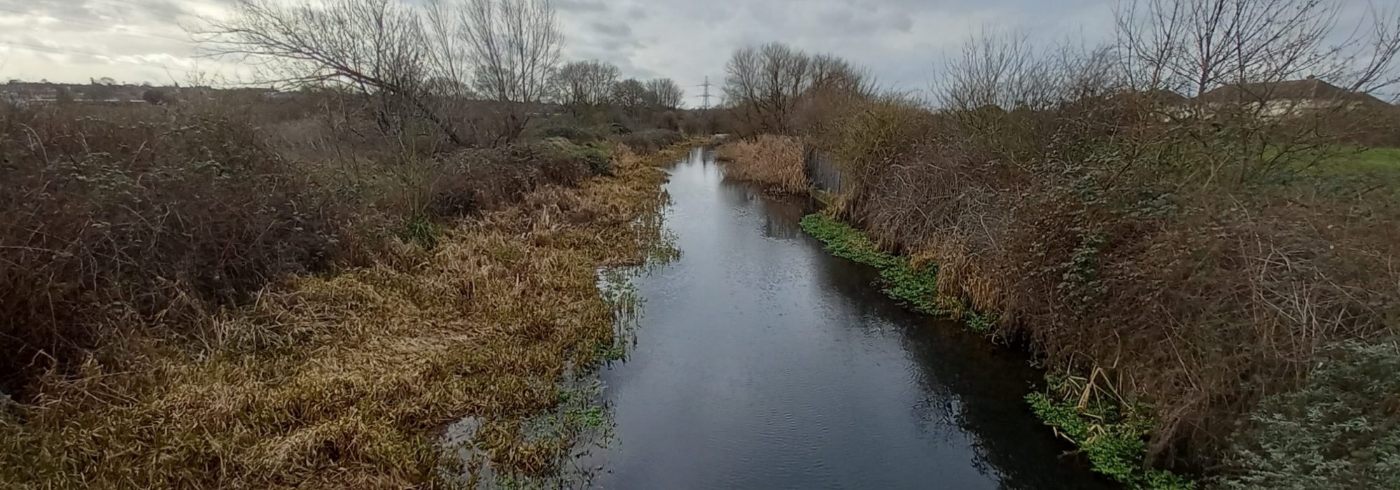 the river cray seen from a bridge on a stormy day